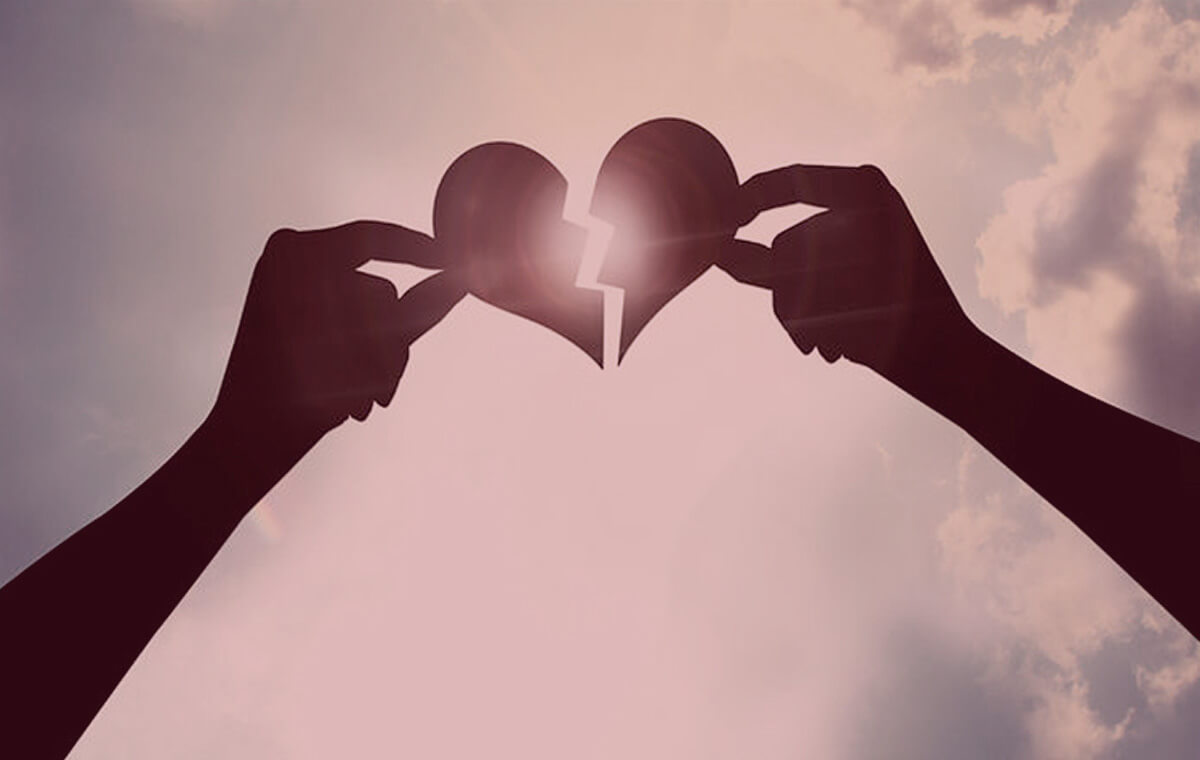 couple holding a heart couple - heart